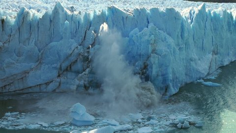 Perito Moreno glacier in Los Glaciares National Park near El Calafate, Argentina,  view of massive ice chunks collapsing into the water. 