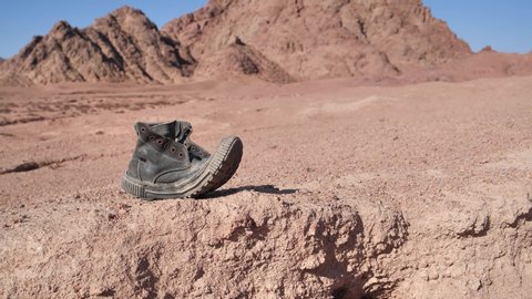 Old boot in the desert, Sinai mountains, Egypt