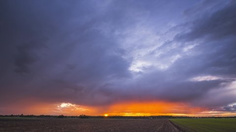 Dramatic colorful timelapse of sunset light in the evening