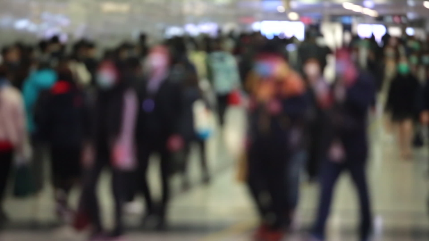 Blurred masked people with motion in Hong Kong  | Shutterstock HD Video #1045863010