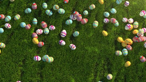 Easter eggs on the grass. Easter eggs slide down the slope covered with green cereal. Sunny positive climate. Beautiful surroundings and cheerful animation. Check out my channel, other easter videos.
