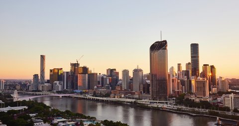 Locked off stationary Time elapse motion of sunrise reflecting on the skyline of Brisbane city at high angle view going from sunrise to early morning Brisbane,Queensland,Australia, May 5 2019	
