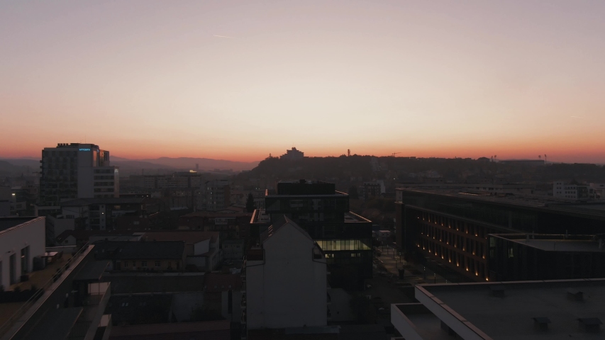 Aerial of Cluj-Napoca at night right after sunset in Romania