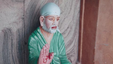 Close shot of Om Sai Ram murti/Idol in a Hindu temple.