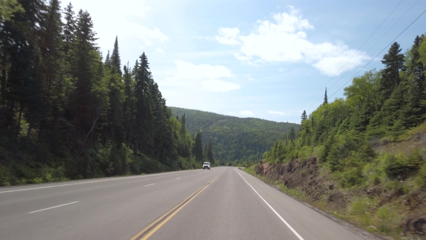 Driving westwards on Ontario highway 17 during a foggy summer day