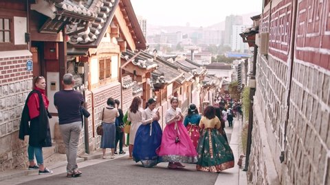 Seoul , Seoul / South Korea - 11 03 2019: Tourists walking bukchon hanoak village in Seoul