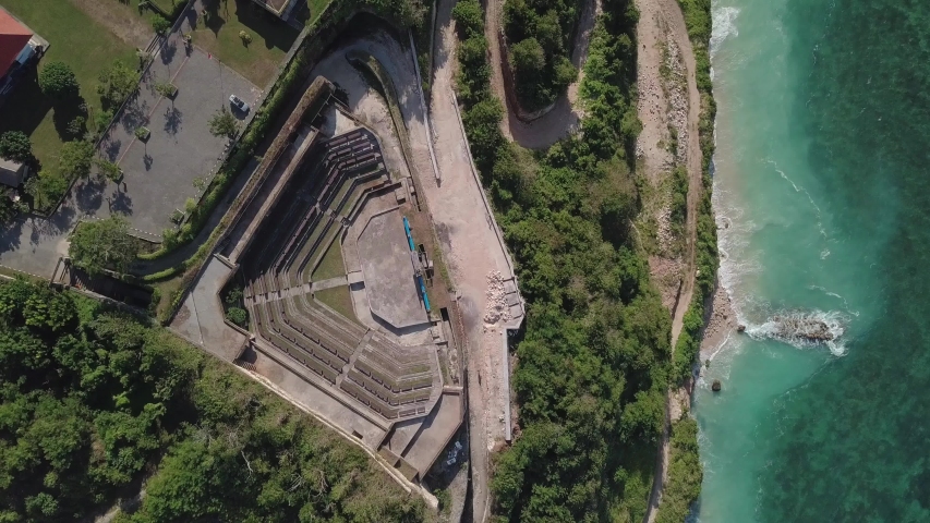 Aerial view on tropical Bali beach with scenery hindu amphitheater