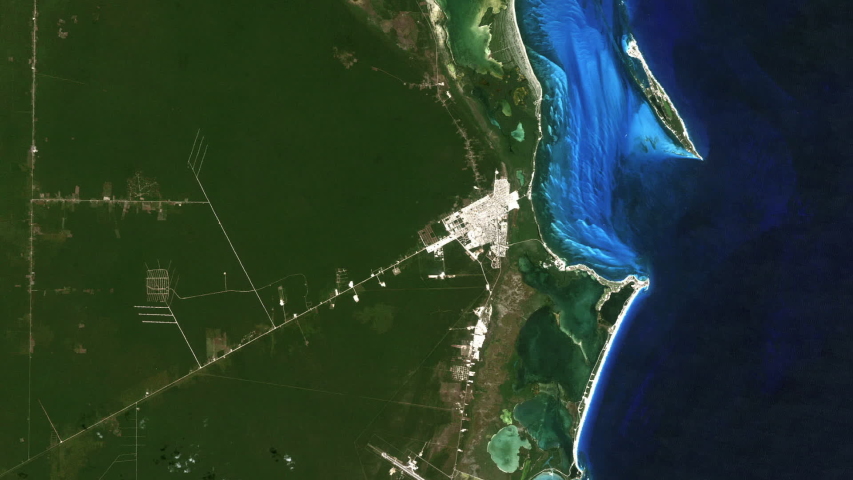 City growth time lapse aerial view of Cancun Mexico tourist destination on caribbean sea.  Satellite images furnished by Nasa