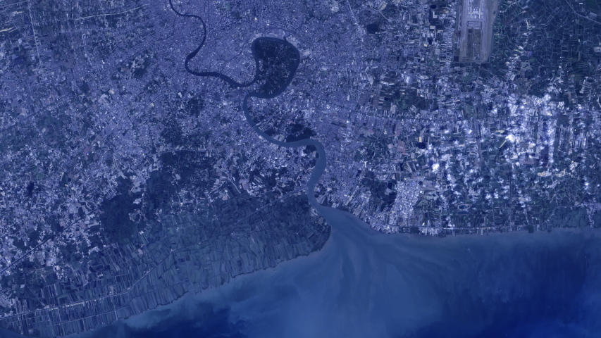 Sunrise animation aerial satellite view over city of Bangkok Thailand capital. Images furnished by Nasa