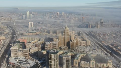 Nur-Sultan - December 2019: Aerial winter foggy view of the  Kazakhstan capital.