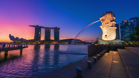 SINGAPORE-JANUARY 24,2020:The Merlion fountain and Marina Bay on morning in Singapore. Merlion is a mythical creature with the head of a lion and the body of a fish and is a symbol of Singapore