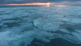 White sea covered with ice. Huge ice floes cover the water. Beautiful clean arctic ice. Frozen North Sea. Aerial - Powered by Shutterstock - Get 15% off with code: PIKWIZARD15