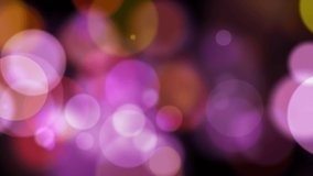 Abstract motion background shining gold particles. Shimmering Glittering Particles With Bokeh. Seamless 4K loop video