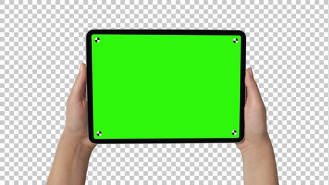 New York / USA, July 28 2019: - Holding iPad Pro Tablet In Female Hands with alpha channel background and trackers for easy screen replacement.