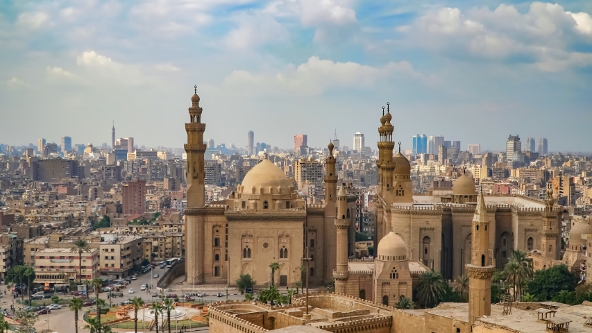 Aerial view of the old part of Cairo. Mosque-Madrassa of Sultan Hassan. Cairo. Egypt. Timelapse. Royalty-Free Stock Footage #1046082769