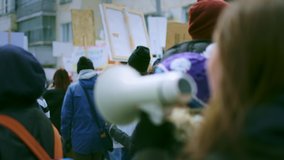 Women march movement power sign equality. Strike empowerment action stop. Activist resistance. People city street. Young adult female activist feminist demonstration. Gender feminism fight resistance. - Powered by Shutterstock - Get 15% off with code: PIKWIZARD15