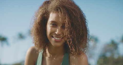 Portrait of beautiful healthy african american woman smiling and living confidently, female healthy living and outdoors fitness concept