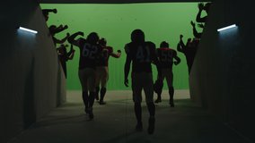 GREEN SCREEN CHROMA KEY American football team walking through a stadium tunnel entrance before the game, fans cheering at the stadium. 4K UHD shot on ARRI Alexa Mini - Powered by Shutterstock - Get 15% off with code: PIKWIZARD15
