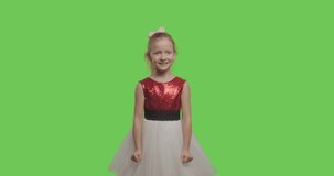 Surprised girl laughing. Happy smiling young pretty woman having fun on Green Screen, Chroma Key. 4k video footage slow motion 60 fps