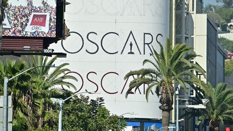 Los Angeles, California / USA - February 8th 2020: Billboard with Oscars gala logo on the building wall in Hollywood where the Academy Awards is taking place