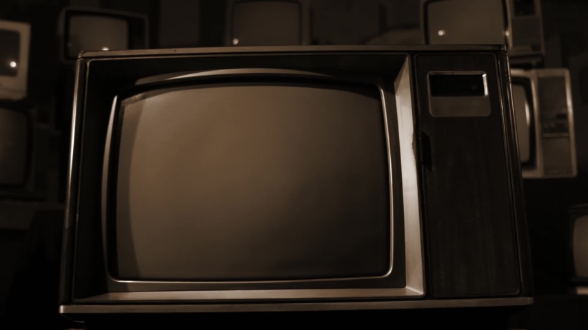 Retro Wood Style TV Set with Green Screen. Sepia Tone. Dolly In. You can Replace Green Screen with the Footage or Picture you Want with “Keying” effect in After FX (check out tutorials on YouTube). Royalty-Free Stock Footage #1046171467
