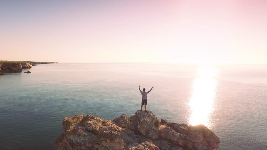 Young Man On Beach Cliffs Stock Footage Video (100% Royalty-free) 10461929  | Shutterstock