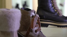 Pair of shoes in a store showroom - Powered by Shutterstock - Get 15% off with code: PIKWIZARD15