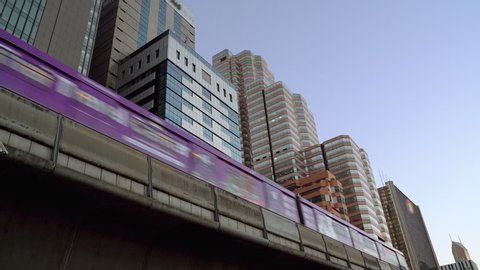 Electric train in monorail system, raised above the ground in Bangkok
