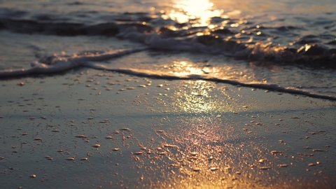 Black sea. Sunset or sunrise on beautiful paradise sand beach on the island in slow motion 