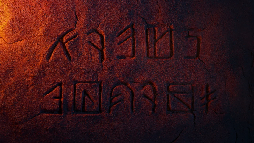Old Runes Carving Lit Up In Dusty Cave