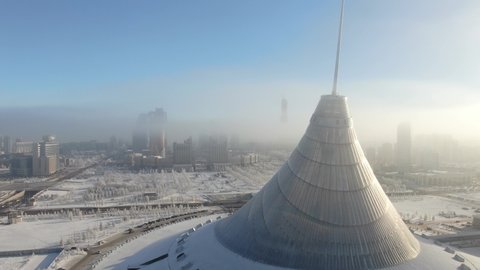 Nur-Sultan - December 2019: Aerial winter view of the Khan Shatyr building. Winter view of the Kazakhstan capital.