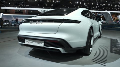 BRUSSELS, BELGIUM - JANUARY 9, 2020: Porsche Taycan Turbo S all-electric luxury performance car on display at Brussels Expo