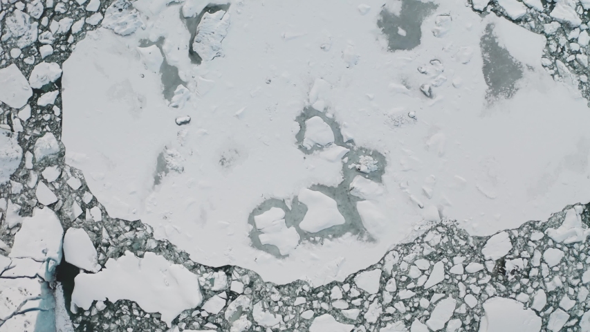 Aerial view of the J kuls rl n glacial lagoon and floating icebergs. The beginning of spring in Iceland