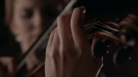Hands of Music Player on Classic Violin Close Up. Emotion of Talented Musician Playing Acoustic Melody Indoors. Action at Work of Pretty Woman as Violinist. Wooden Equipment for Artistic Show at Room