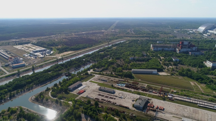 Aerial of Chernobyl zone, Chernobyl Nuclear Power Plant sarcophagus and ...