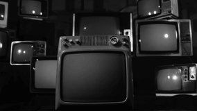 The Lights of the Cities from Space at Night, Seen on a Retro TV. Black and White Tone. Dolly In. Elements of this video furnished by NASA. 