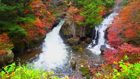 Ryuzu falls waterfall in changed forest in Autumn time at Nikko Japan