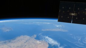 International Space Station view of rotating cloudy planet earth above Mediterranean Sea. Created from Public Domain images, courtesy of NASA Johnson Space Center : http://eol.jsc.nasa.gov. Tilt down