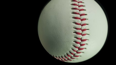 Baseball ball. Ball games and sport. Individual isolated baseballs spinning and tracking forwards towards the camera. Baseball close up.