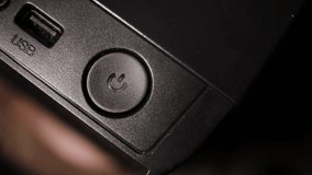 man presses the power button - Powered by Shutterstock - Get 15% off with code: PIKWIZARD15