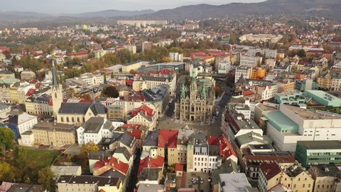 Scenic view from drone of Liberec cityscape with ancient Town Hall on sunny autumn day, Czech Republic
