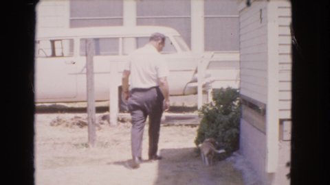BARSTOW CALIFORNIA USA-1966: The Person Is Walking In The Ground And Near The Dog Is Going