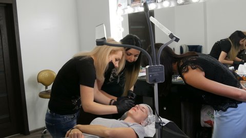 September 7, 2019 - Kamenskoye, Ukraine: Master class on eyebrow microblading training. The teacher teaches his students to do permanent makeup in a beauty studio