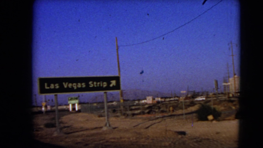 LAS VEGAS NEVADA-1966: Passing By Street Signs On The Highway Near Las Vegas