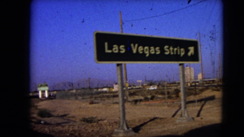 LAS VEGAS NEVADA-1966: Passing By Street Signs On The Highway Near Las Vegas