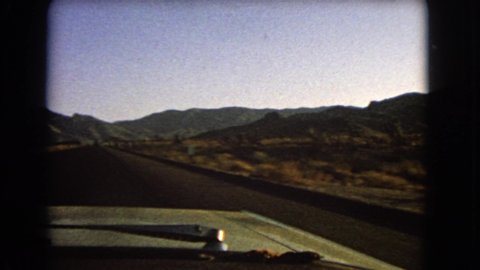 NEVADA USA-1966: Person Driving A Car To Searchlight That Is The Next Exit