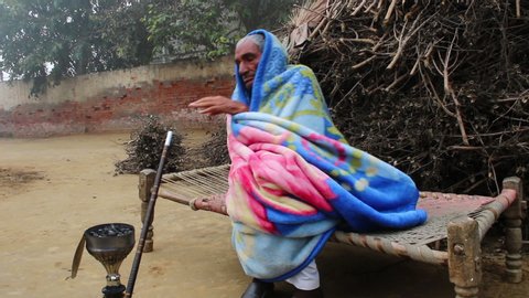 Fatehabad, Haryana, India - February 2, 2020: Old Men Enjoying Hookah
