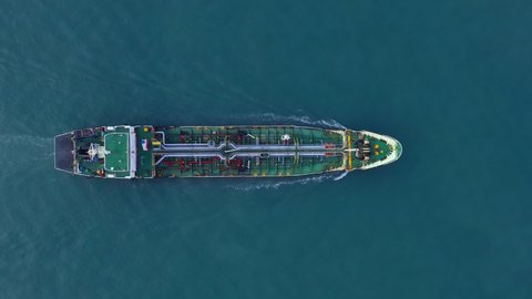 Aerial view cargo ship of business logistic sea freight, Crude oil tanker lpg ngv at industrial estate Thailand  Group Oil tanker ship to Port of Singapore - import export. 4K
