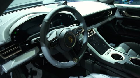 BRUSSELS, BELGIUM - JANUARY 9, 2020: Porsche Taycan Turbo all-electric luxury performance car interior on display at Brussels, Expo
