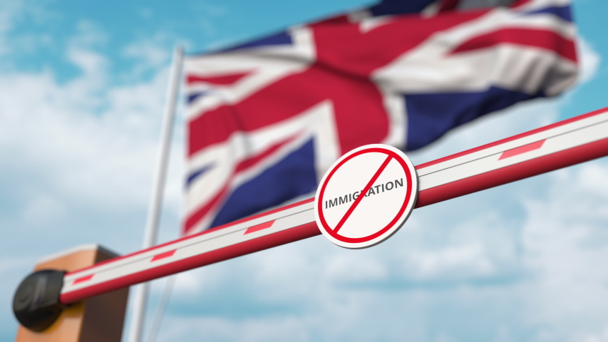 Barrier gate with no immigration sign being closed with flag of the UK as a background. British border closure or immigration ban Royalty-Free Stock Footage #1046471035